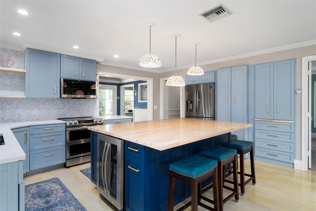 Custom cabinetry, coffee bar and pantry