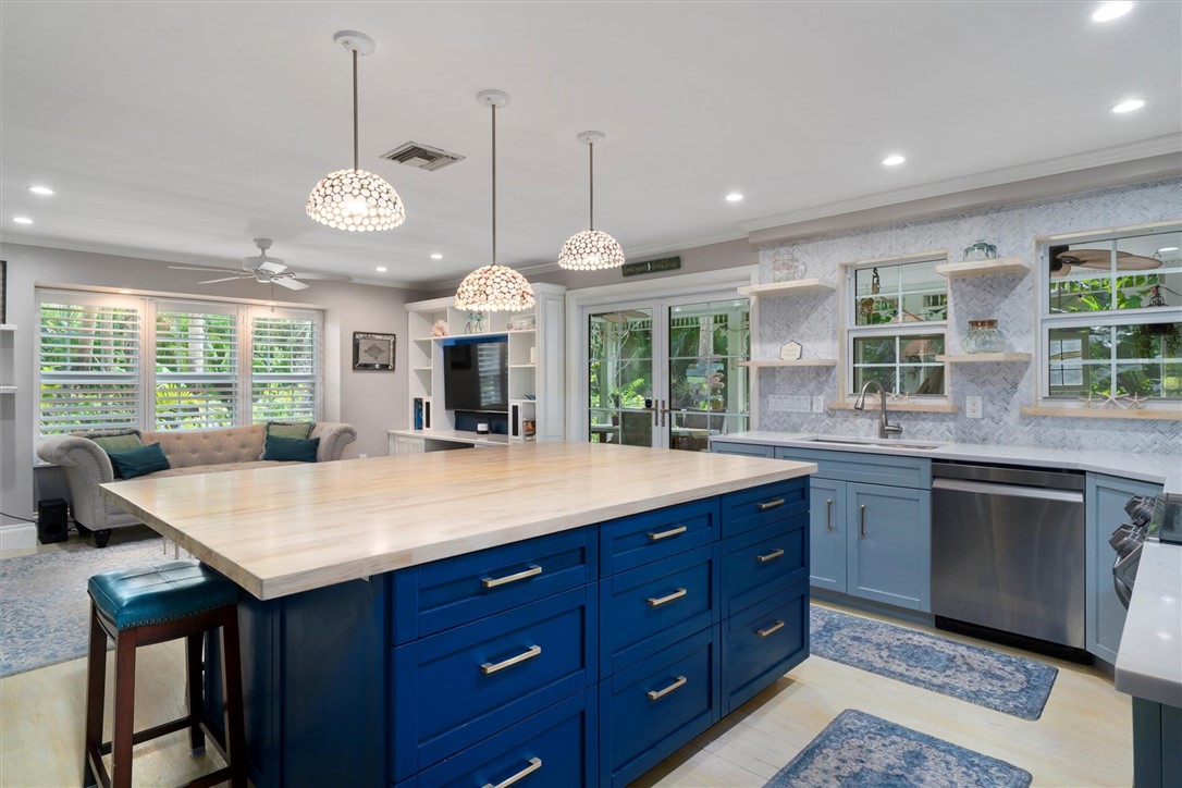 Renovated Kitchen with butcher block large island