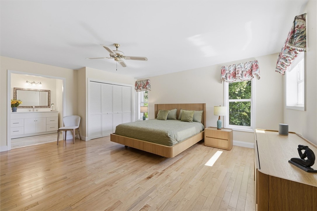 Generous sizes Bedroom with light wood maple floor