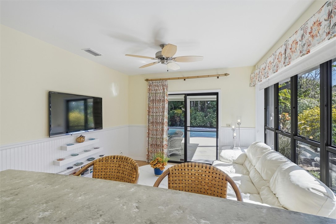  Florida sun room off kitchen to outside porch and