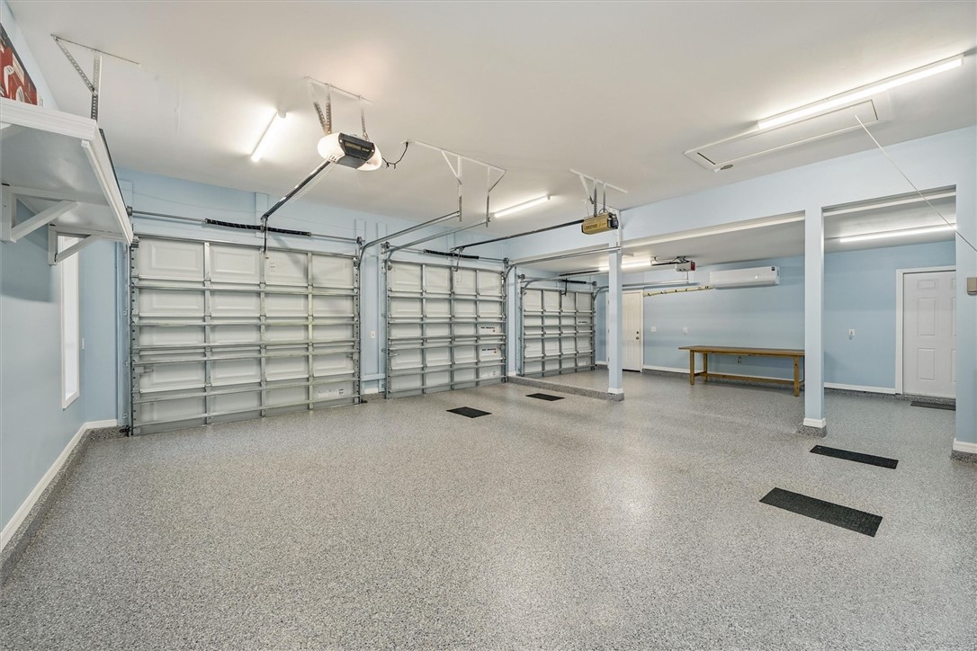 3+ car garage, hurricane impact doors and new epox