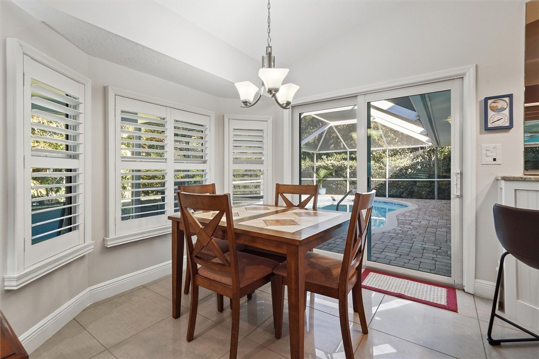 Breakfast nook leading to pool area