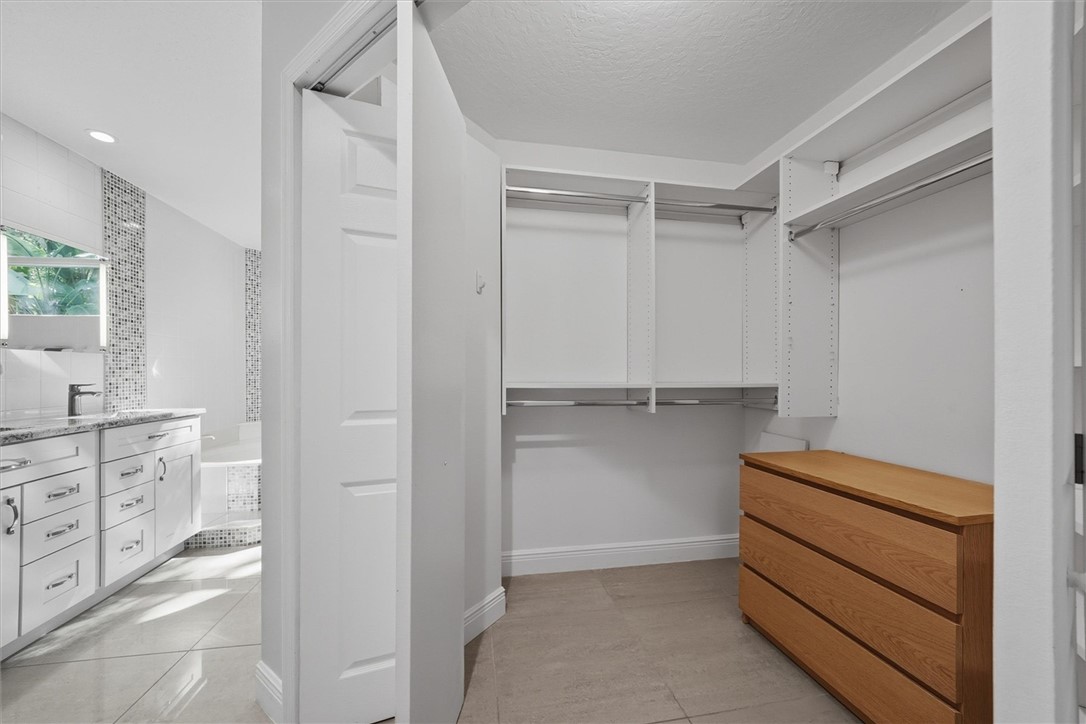 Large walk in closet in primary bedroom