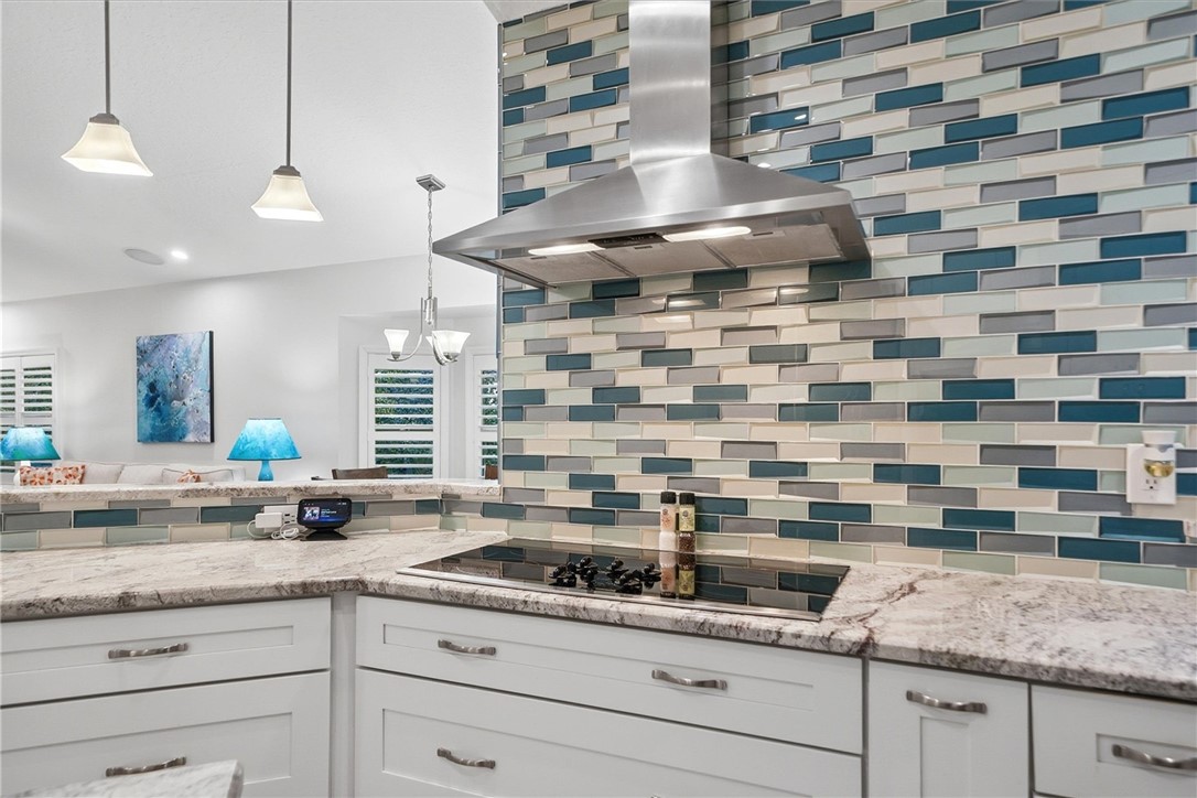 Kitchen featuring, extractor fan, pendant lighting