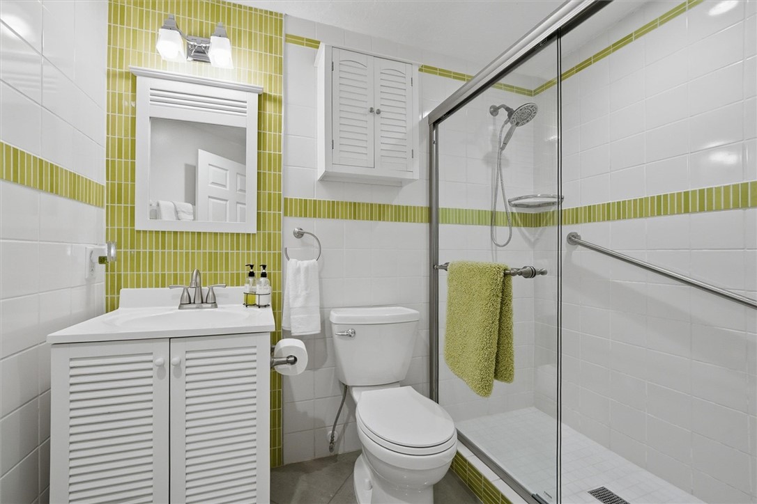 Guest bathroom with matching decorative tile