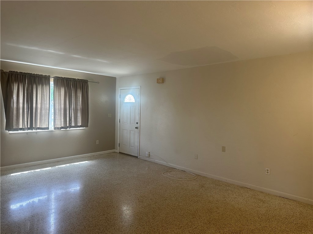 Living room area with terrazzo floors