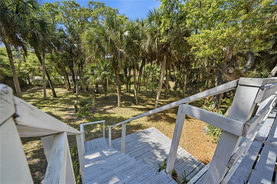 Stairs leading to back yard from living room slide