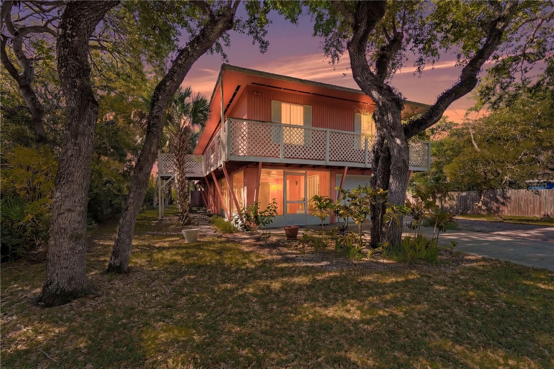 View of cottage at dusk