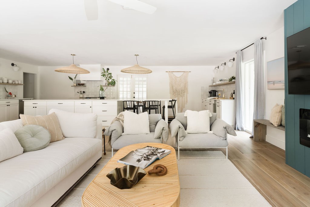 Open concept living area featuring wood-finish flo