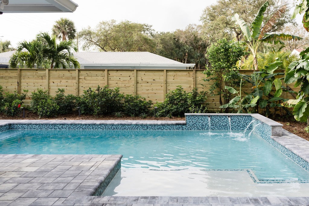 Swimming pool with patterned tile accents, integra