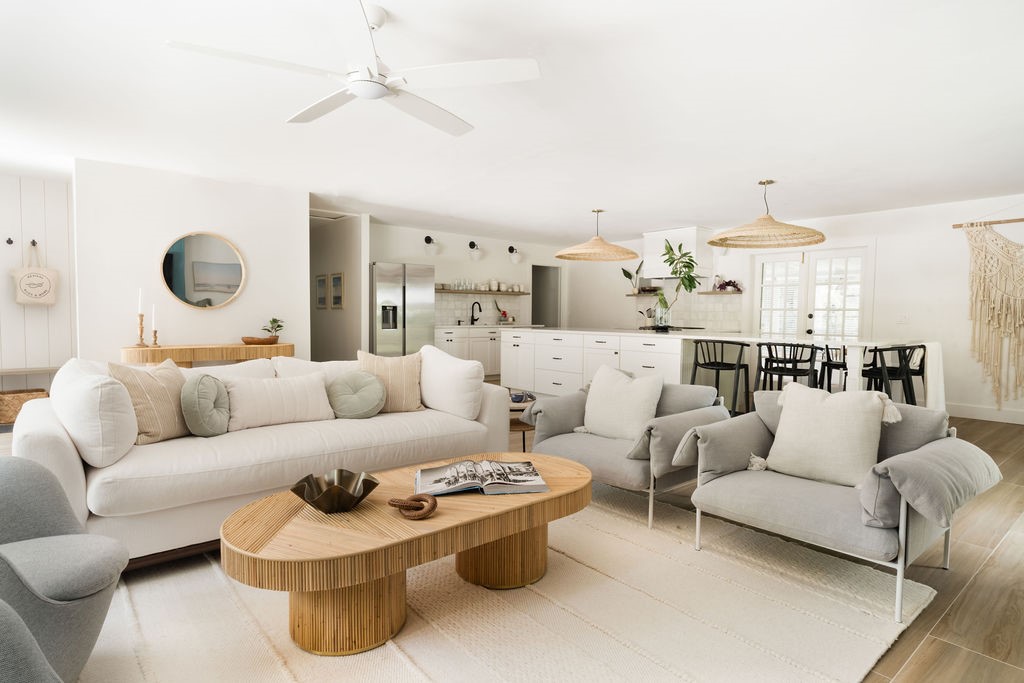 Open-concept living space featuring light wood-fin