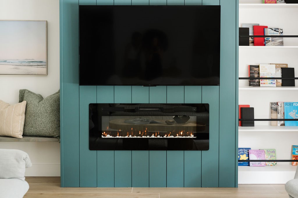 Integrated wall-mounted television and linear elec