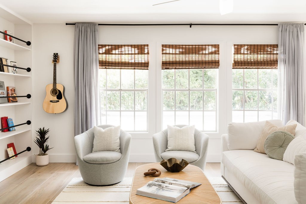 Living area featuring natural light, wood-finish f