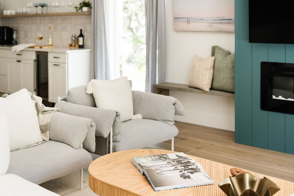 Living area featuring wood-finish flooring and a b