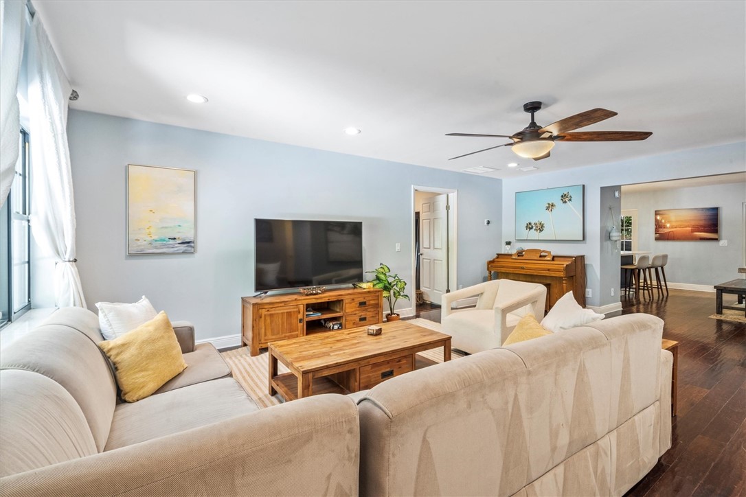 Spacious living area leading to dining room and ki