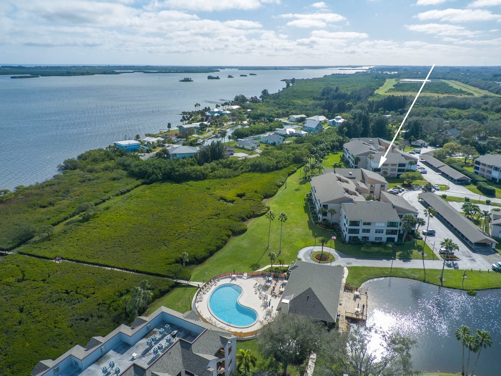 Waterfront condominium community featuring multipl