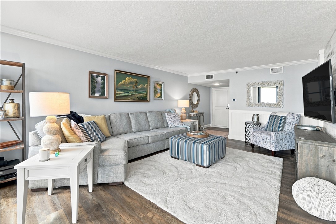 Spacious living area featuring luxury vinyl floori