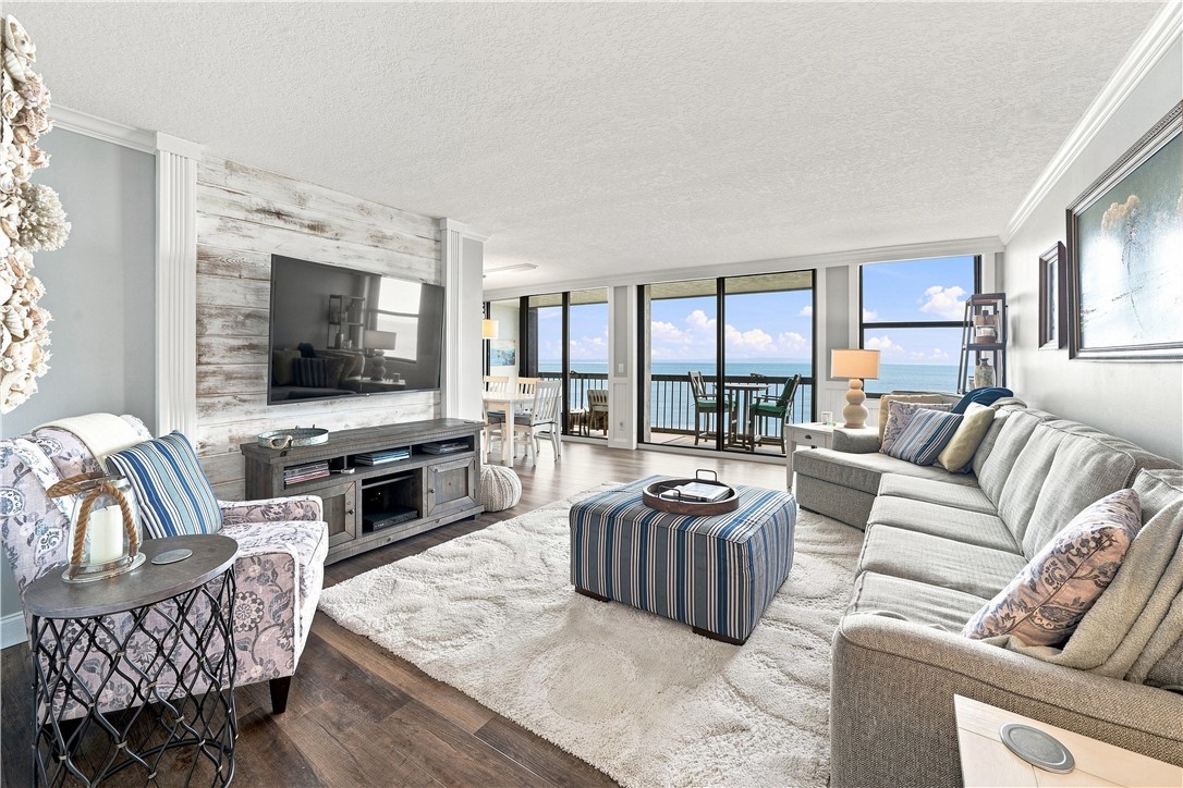 Expansive living area with custom shiplap paneling