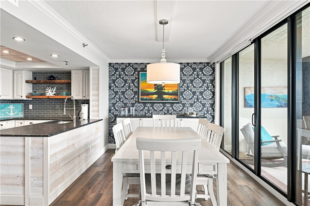 Ocean views from kitchen and dining area with blue