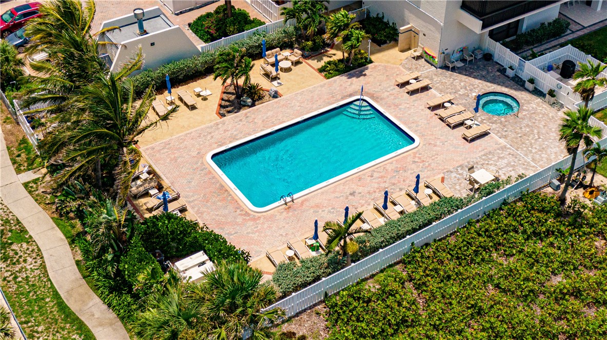 Community heated pool and spa with brick paver dec